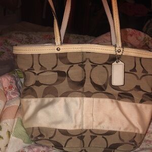 F13548 Canvas signature Coach Brown with beige trim. It is in EUC